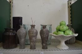Decorative vases and other items.