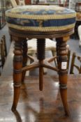 A Victorian revolving music seat.