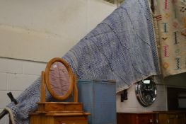 A large blue and cream wool work carpet 276cm x 160cm.