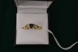 A 14ct gold and gem set ring, size M.