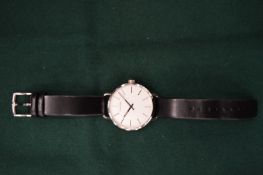 A Calvin Klein stainless steel wristwatch.