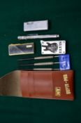 Cigarette lighters and a set of darts etc.