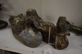 Two old decoy ducks.