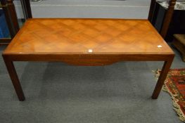 A mahogany rectangular coffee table.