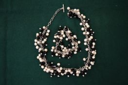 A Besarani crystal and pearl necklace and bracelet.
