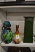 A bottle vase, turquoise glazed and floral decorated Art Nouveau vase and another vase signed Philip