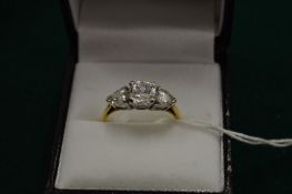 A gold and cubic zirconia, size P.