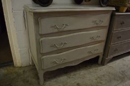 A painted three drawer chest.