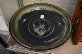 A large studio pottery pedestal dish.