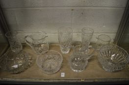 Cut glass bowls, jugs and vases.