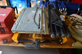 A De Walt DW742 table saw with leg assembly.