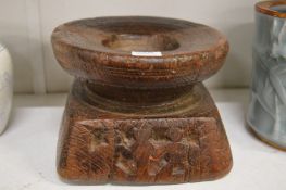 An unusual carved hardwood stand.