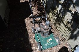 A Hayterette petrol rotary lawn mower.