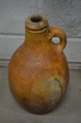 A stoneware jug.