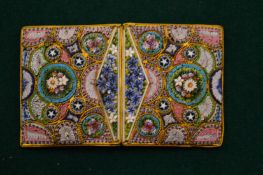 A micro mosaic belt buckle.