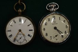 A silver pocket watch and another pocket watch.