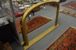 A Victorian style gilt framed over-mantle mirror.