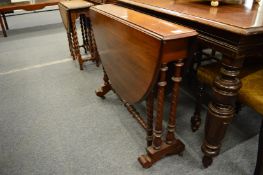 A Victorian walnut Sutherland table.