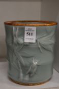 A Chinese celadon brush pot.