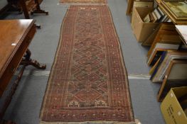 An old Persian runner 290cm x 100cm.