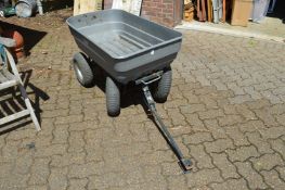 A four wheeled garden trolley.