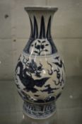 A Chinese blue and white porcelain dragon vase.