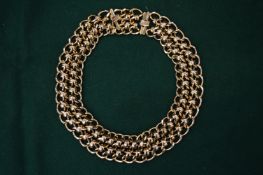 A Monet heavy gilt chain.