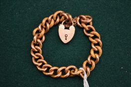 A 9ct gold hollow chain link bracelet with heart shaped clasp.