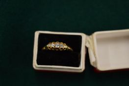 An 18ct gold Victorian diamond five stone ring, size O.