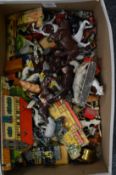 A collection of die-cast farmyard animals, small porcelain figures etc.