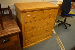 A modern pine chest of drawers