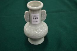A small Chinese pale celadon vase.