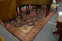 A good large Persian style carpet, cream and blue ground with all-over floral decoration 315cm x