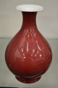 A Chinese Sang de Boeuf vase.