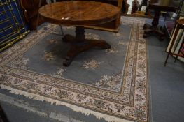 A machine made Persian style carpet, grey ground with floral decoration 330cm x 240cm.