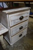A small distress painted three drawer chest.