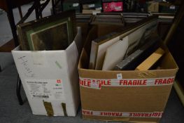 Two boxes of assorted paintings and prints.