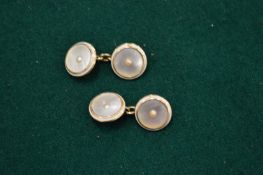 A pair of Edwardian 9ct gold and mother of pearl cufflinks.