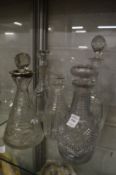 Five various cut glass decanters.