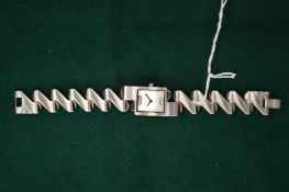 A Gucci stainless steel wristwatch.