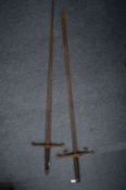 Two old two handed swords.