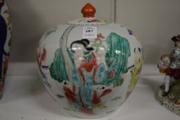 A Chinese famille rose bulbous shaped jar and cover.