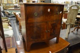 A 19th century mahogany small bow front commode.