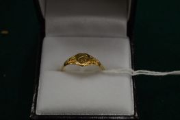 A 9ct gold signet ring, size R.