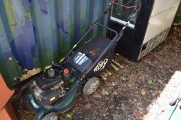 A BMC rotary lawn mower.