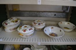 Three Royal Worcester Evesham covered dishes together with a pair of fruit decorated bowls.