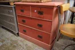 A pink pine painted chest of drawers.