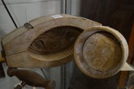 Two early wooden moulds.