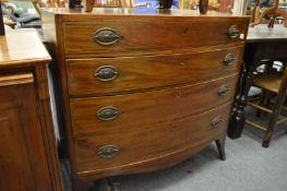 A George III mahogany four drawer chest of splay bracket feet.