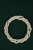 A jade twist bangle.